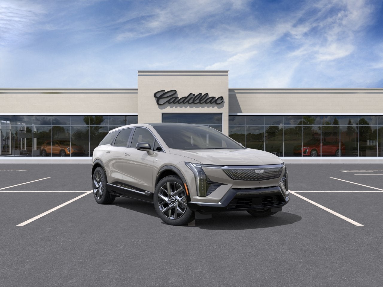 2027 Cadillac OPTIQ Luxury in Sandstone — front three-quarter view