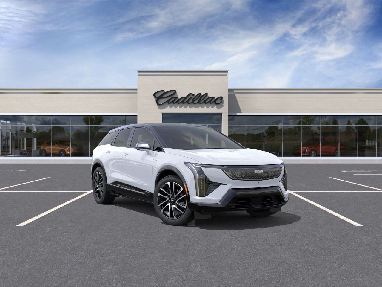 2027 Cadillac OPTIQ Sport in Vibrant White Tricoat — front three-quarter view